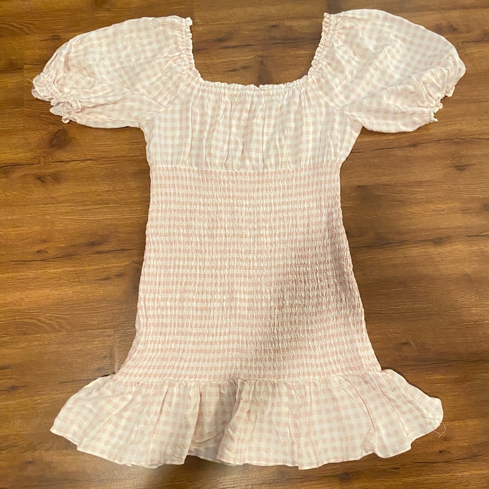 Pink checkered smocked puff sleeve dress